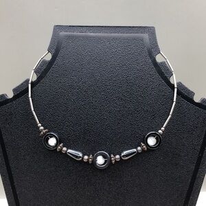 Vintage artisan hematite and cat's eye memory coil wrap choker, boho style.
